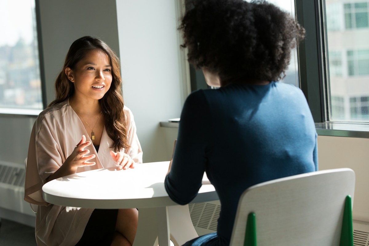 Two people having a supportive conversation